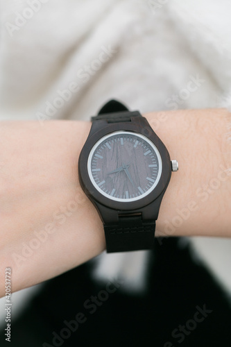 Model wearing modern black watch