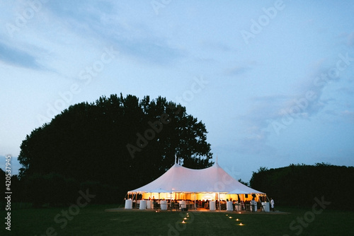 Wedding party tent by night photo