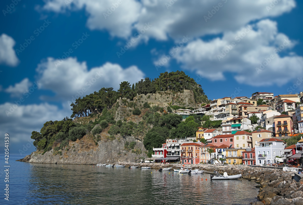 colorful old buildings and ruined castle in Parga Greece