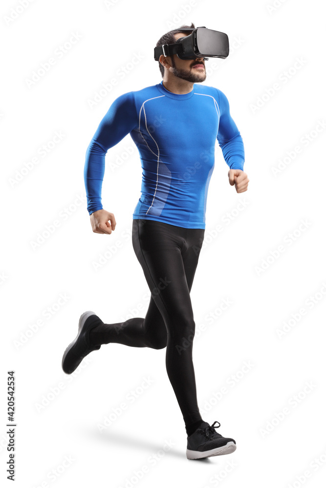 Full length shot of a man jogging with VR goggles Full length shot of a man jogging with VR goggles