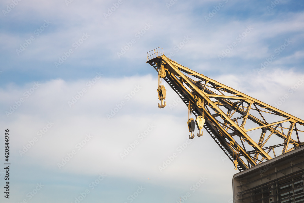 yellow crane on blue sky yellow crane on blue sky