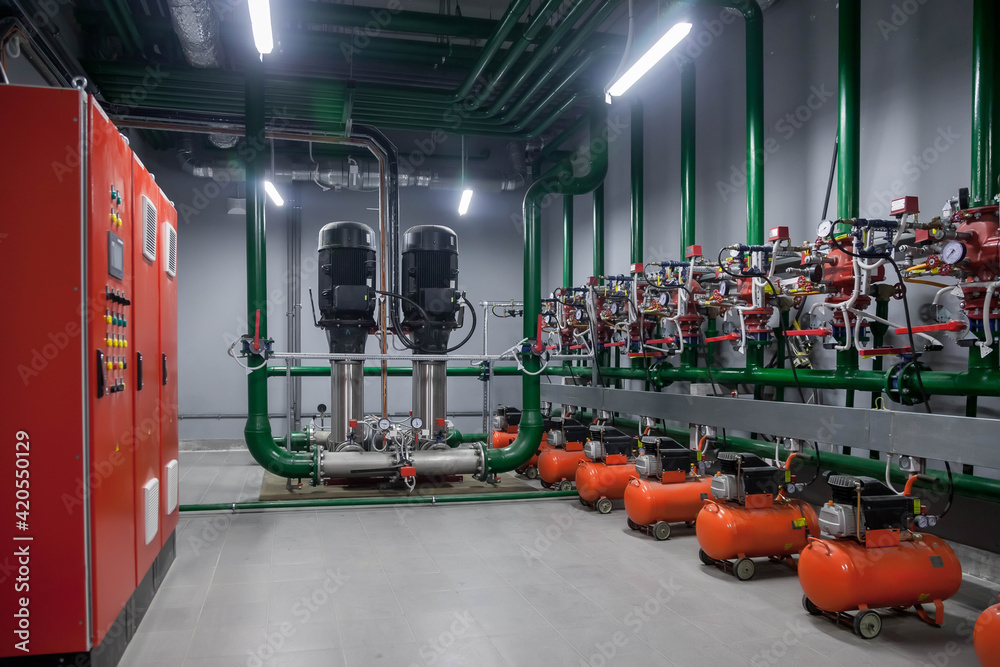 Pump Control Room Foto de Industrial interior of water pump, valves, pressure gauges ...