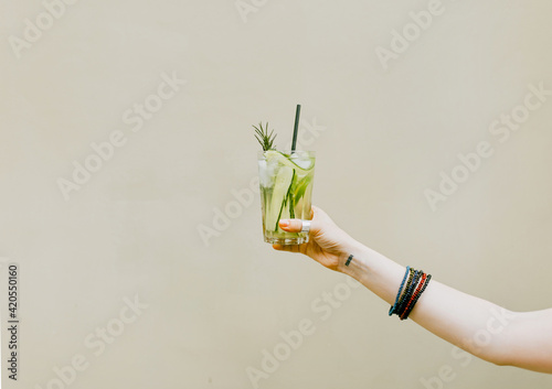 Woman holding cold drink