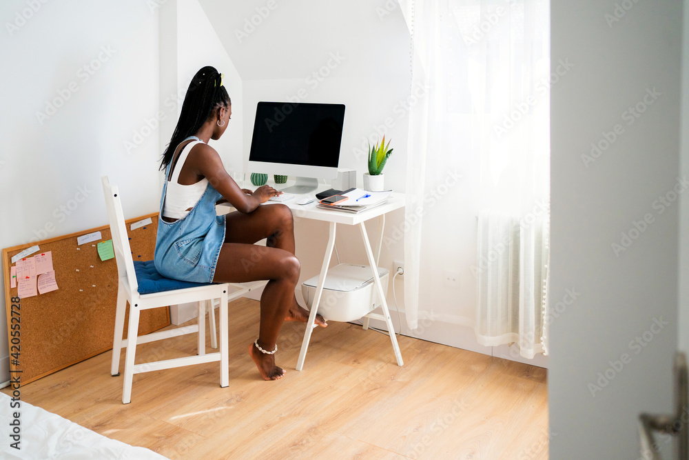 Girl Working From Home In Her Office Room. Girl Working From Home In Her Office Room.