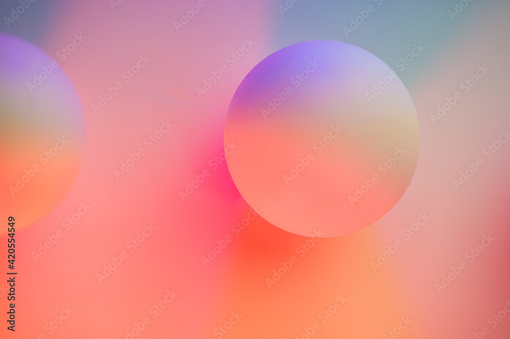 Abstract composition balls in pink, purple pastel color, blurred background.