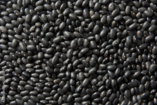 Natural background from black beans. photo