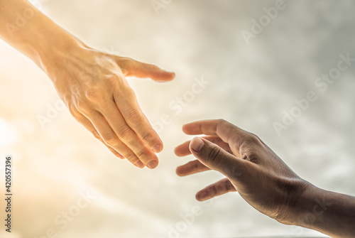 Hand reaching out to help rescue someone in need. 
