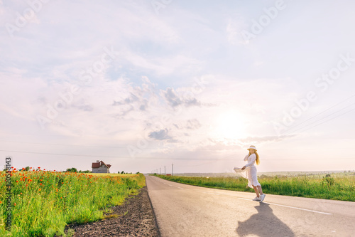 Wallpaper Mural girl in stylish clothes posing on the road. blue sky and red pop Torontodigital.ca