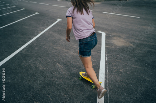 Girl on a skateboard photo