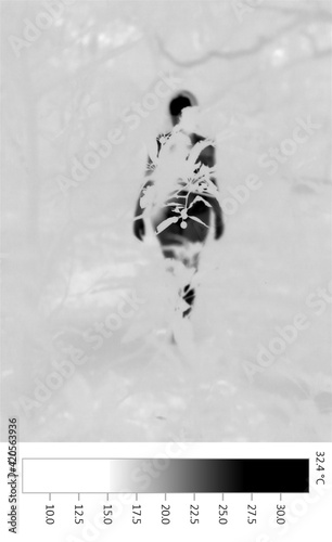 Thermographic thermal heat silhouette of naked nude human and plant shapes in nature