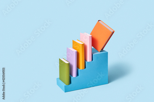 Craft staircase with handmade paper books.
