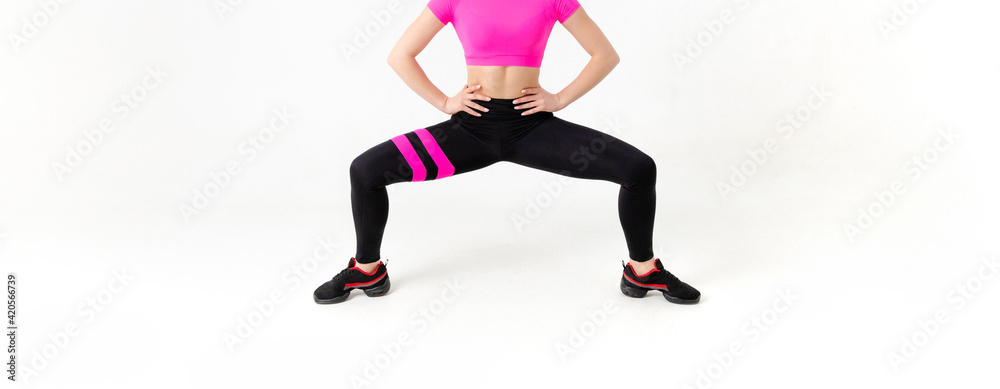 Fototapeta premium Unrecognizable woman doing exercises