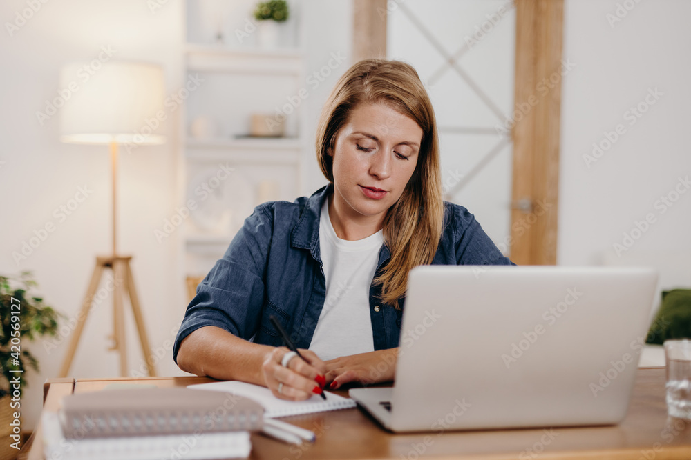 Online psychotherapist making notes during session Online psychotherapist making notes during session