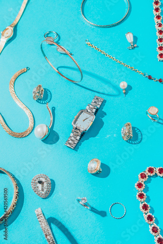 Jewellery,Diamonds, Ruby, Gold, Silver Etc/ On Turquoise Background
