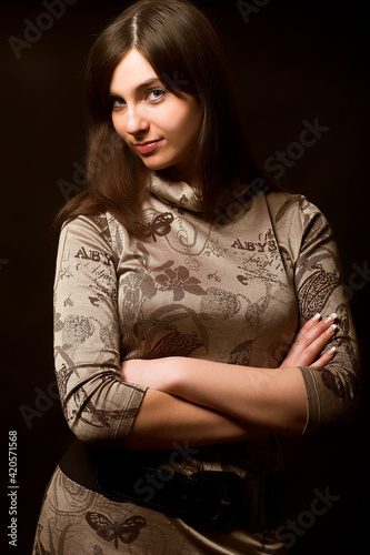 beautiful brunette over black background