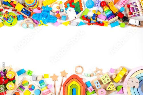Baby kids toy frame. Colorful educational toys on white background. Top view, flat lay, copy space for text