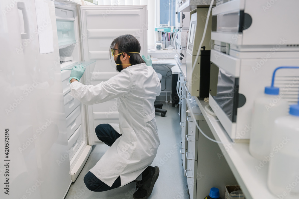 Researcher Looking At The Fridge Researcher Looking At The Fridge