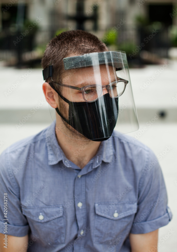 Young man in Face shield Young man in Face shield