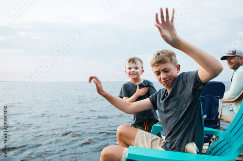 boy drops fish he caught