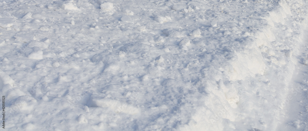 Snow on the side of the road.