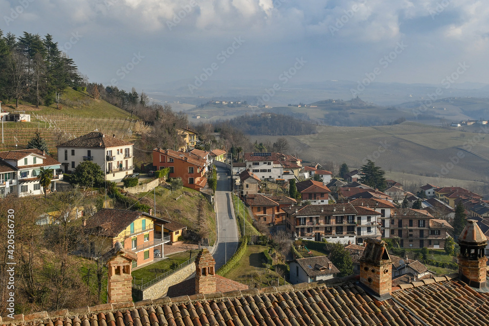 Elevated view of the old village of Monforte d'Alba, in the Langhe vineyard hills, Unesco World Heritage Site, in winter, Cuneo province, Piedmont, Italy