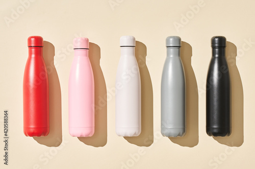 Colorful reusable bottles for water photo