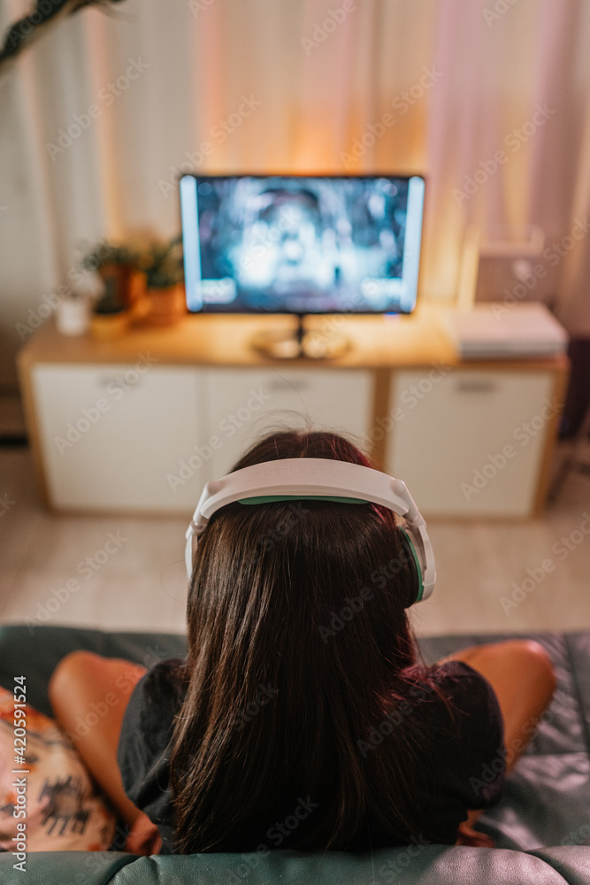 Unrecognizable woman gaming at home Unrecognizable woman gaming at home