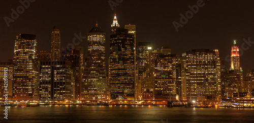 Manhattan skyline at night from Brooklyn, New York.