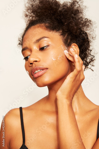 woman hydrating skin