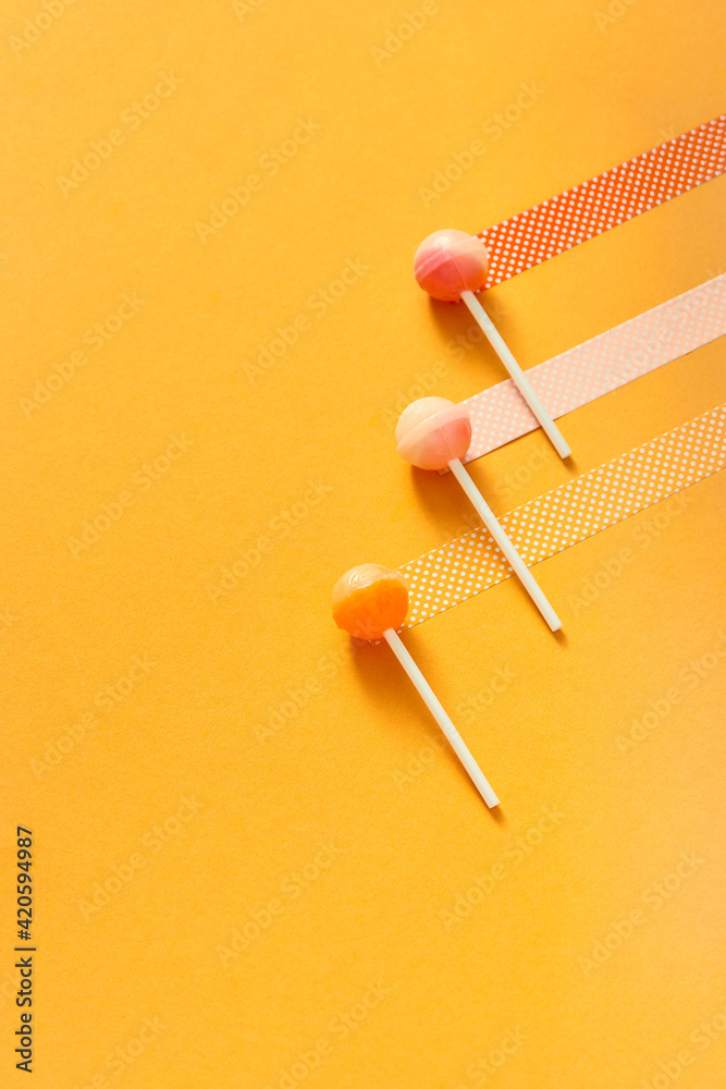 red and yellow chupa chups pattern, lollipops red and yellow chupa chups pattern, lollipops