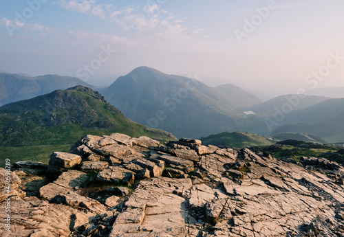 View from Scafell Pike to Lingmell, Great Gable and Styhead Tarn at sunrise. photo