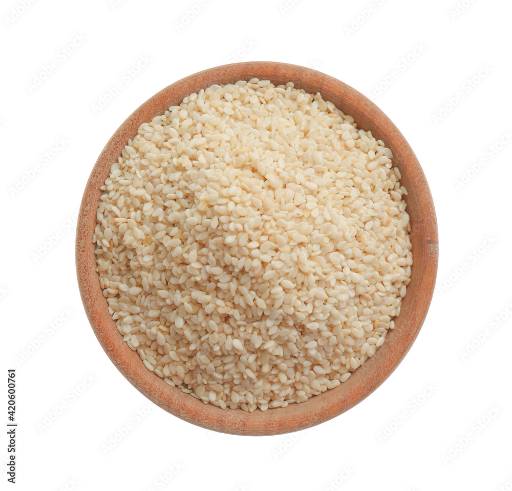 Sesame seeds in bowl on white background, top view