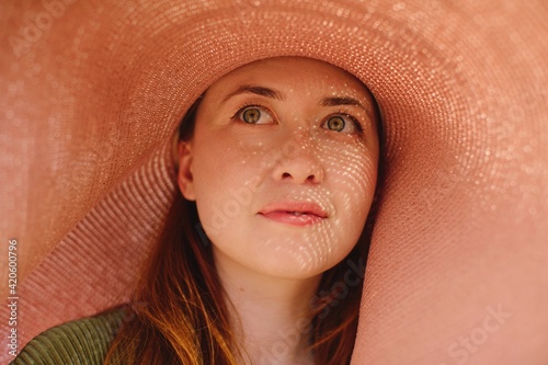 Summer portrait in sun hat