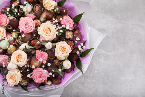 Beautiful food bouquet on light grey table  top view. Space for text