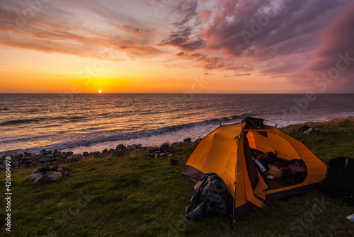 tent on the beach at sunset, Wales