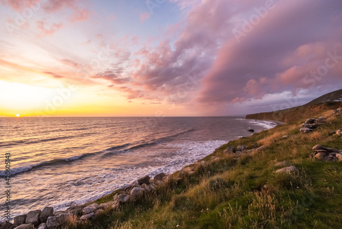 amazing sunset over the sea  coast of wales  england 