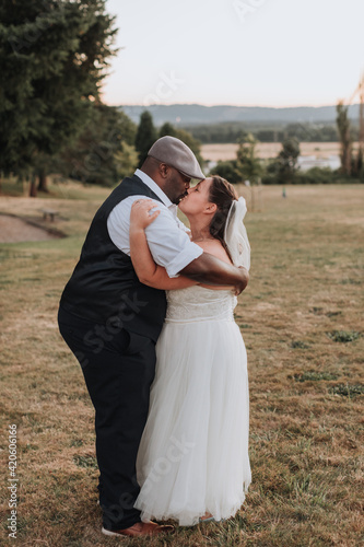Wallpaper Mural Wedding Couple Kissing at Sunset Torontodigital.ca