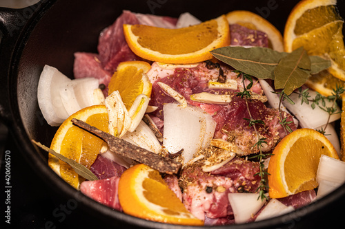 carnitas raw meat in pot