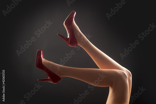 Fashion shoes. Woman sexy feet. Seductive girl legs.