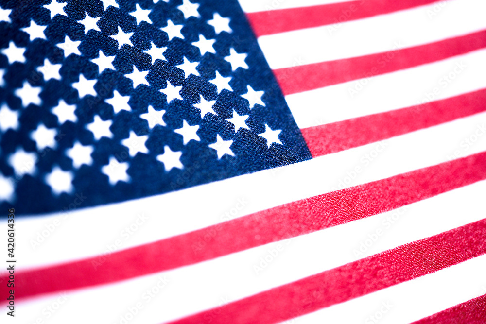 Macro Shot Of Handheld American Flag On Coarse Fabric