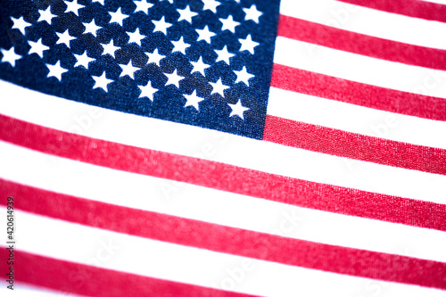 Macro Shot Of Handheld American Flag On Coarse Fabric