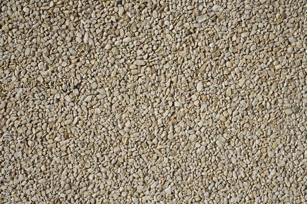 A wall of granite stones as a background. A wall of granite stones as a background.