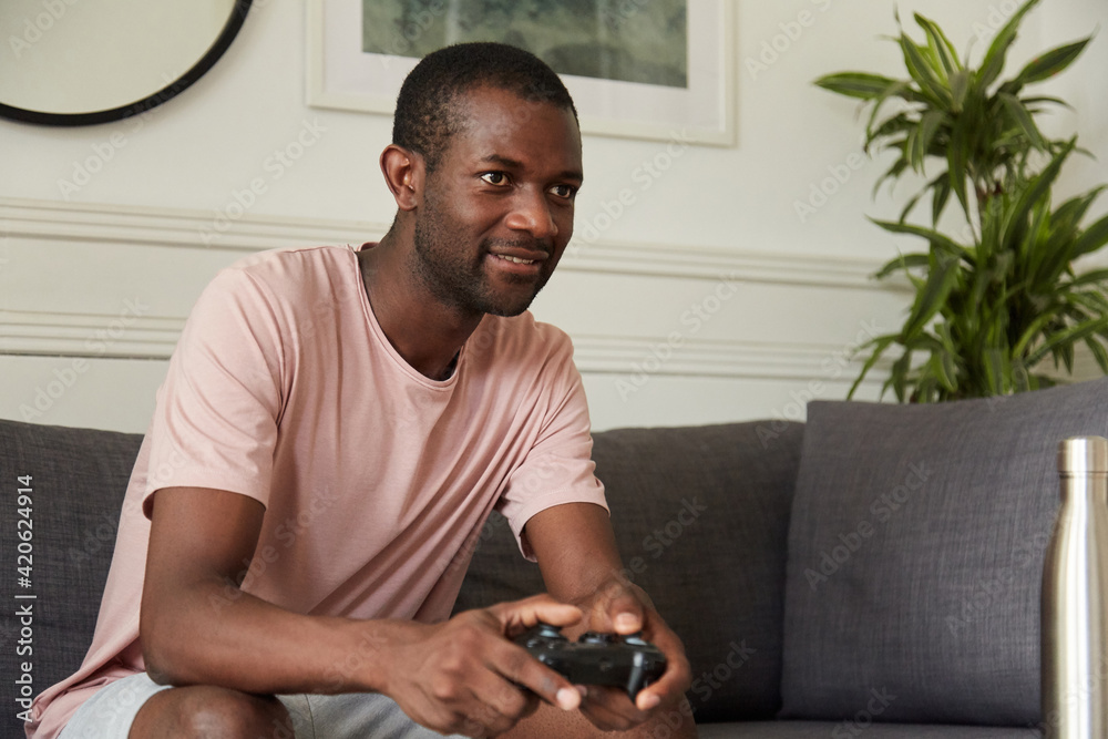 man playing videogames man playing videogames