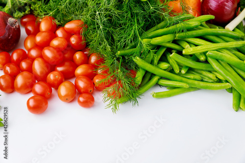 Red cherry tomatoes, green peas and dill.