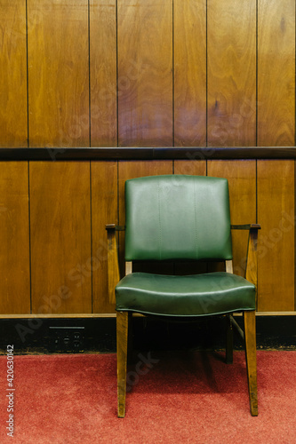 Vintage Chair in retro Office with wood paneling
