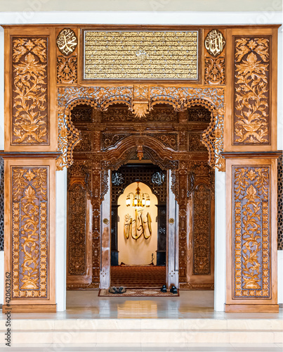 The beautiful carved wood at the entrance of the Masjid Daerah Lundu  Kuching