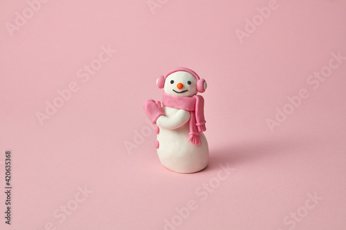 Handmade plasticine or modeling clay figure of Snowman.