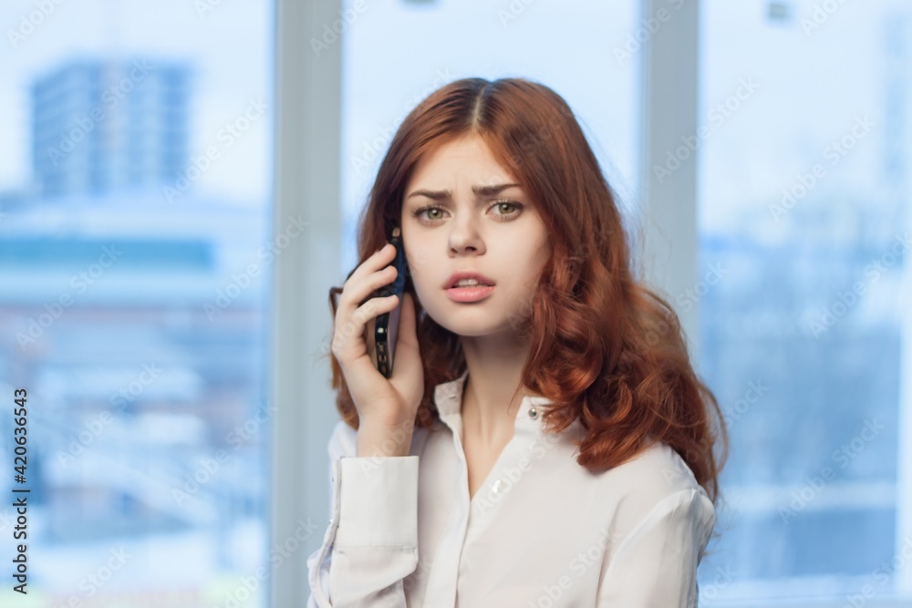 manager in white shirts talking on the phone in the office official manager in white shirts talking on the phone in the office official
