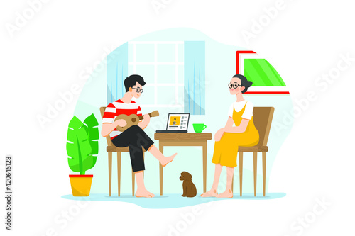 A man learning guitar online with his wife and pet in quarantine time