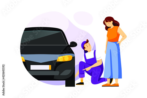Mechanic showing customer the problem with car